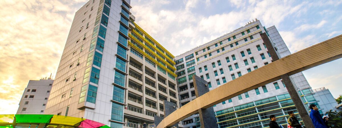 Taiwan Tech Campus; tall buildings with students in the foreground.